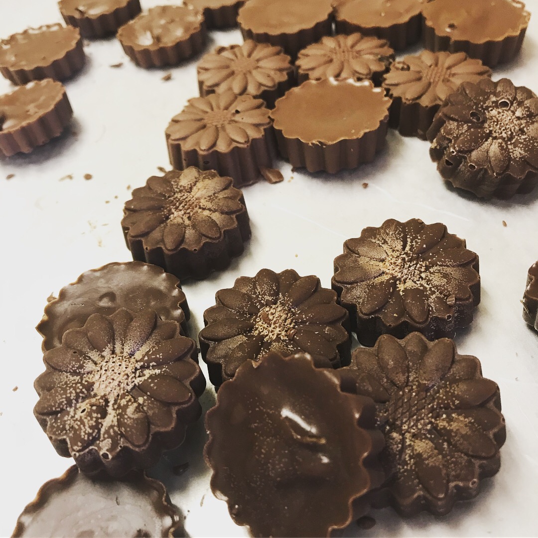 Image of several chocolate candies in the shape of the candy mold